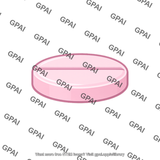 Pink scored tablet